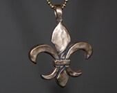 Twisted Fleur de Lis pendant, antique bronze, large size. New Orleans