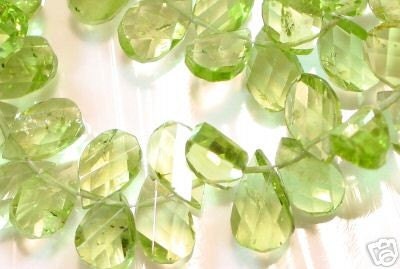 DESTASH - Spiral Twist Faceted Peridot Briolettes - half strand. 45 carats