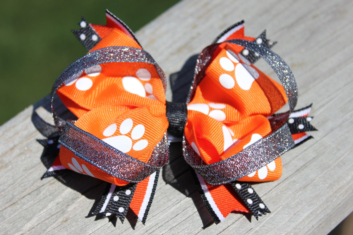 Large paw print spirit cheer bow