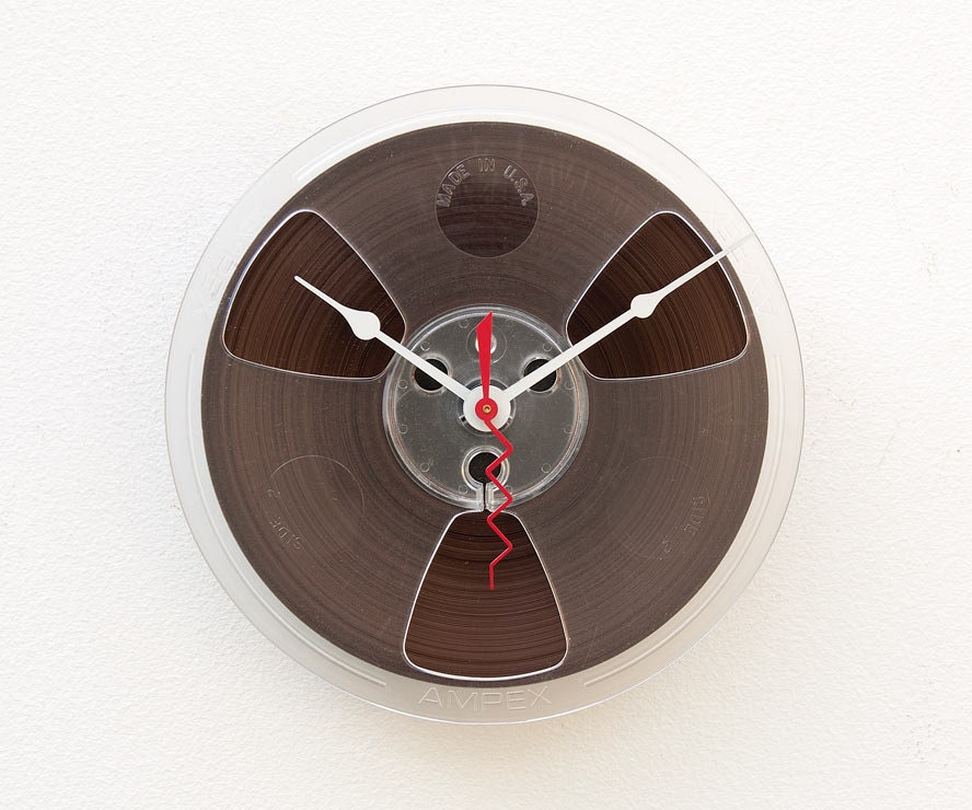 Recycled magnetic tape reel clock