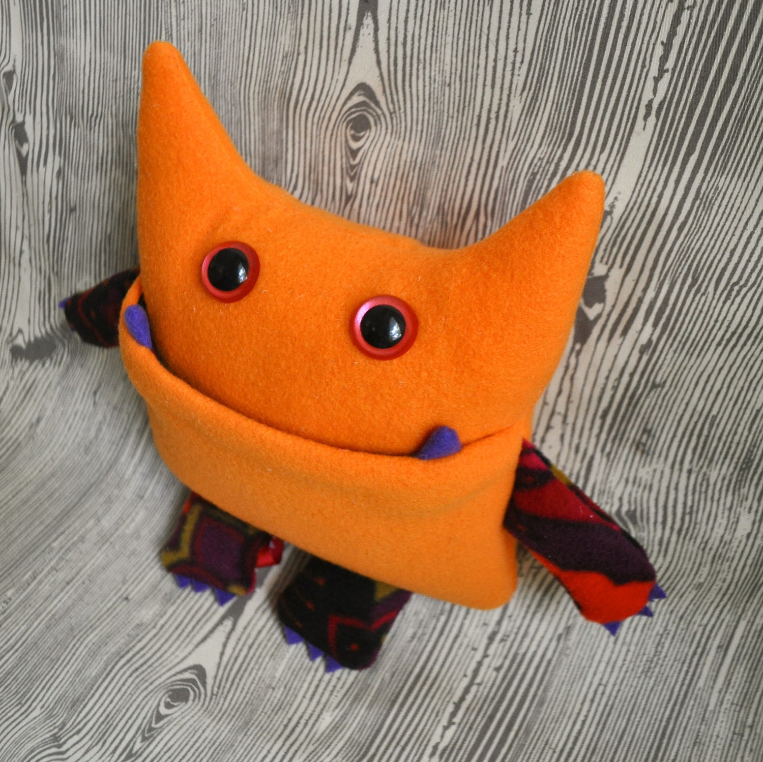 Wibbly Woo - a stuffed plush pocket monster in orange