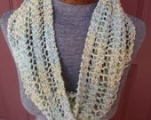 Multi color, long knitted cowl/infinity scarf in pale yellow, green, purple and blue
