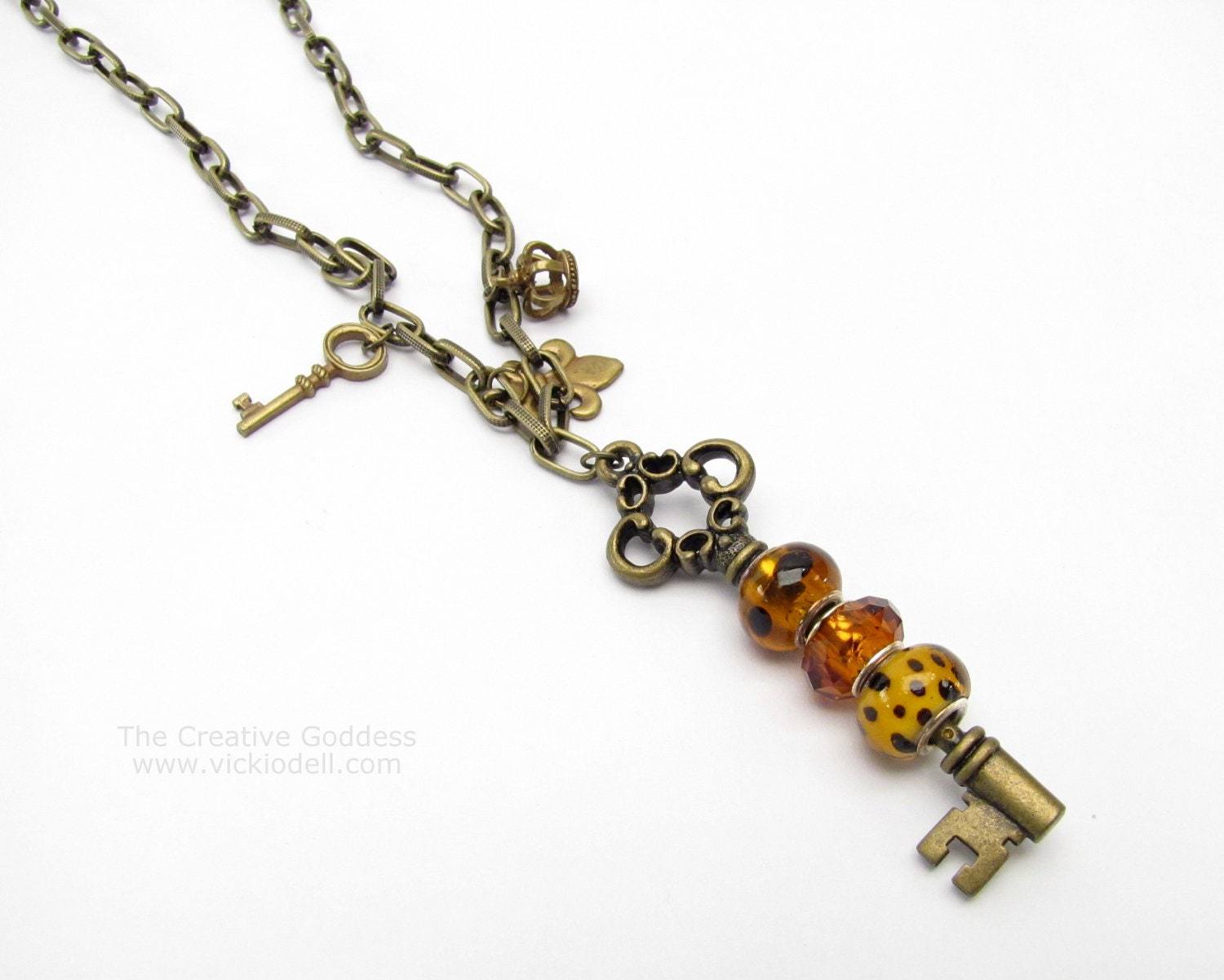 Antique Brass and Amber Large Hole Bead Key and Charm Necklace