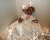 Beautiful Teddy Bear with vintage material satin gown