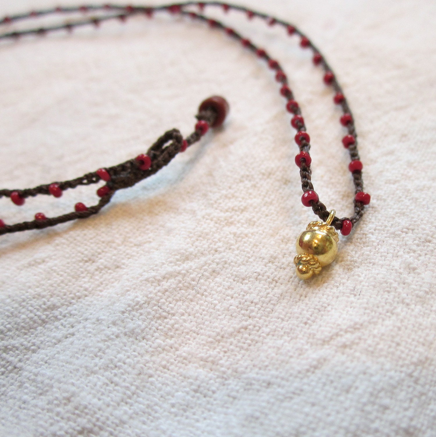 24K Gold Vermeil Ball Charm on daintiest crocheted beaded necklace with brown and red strand