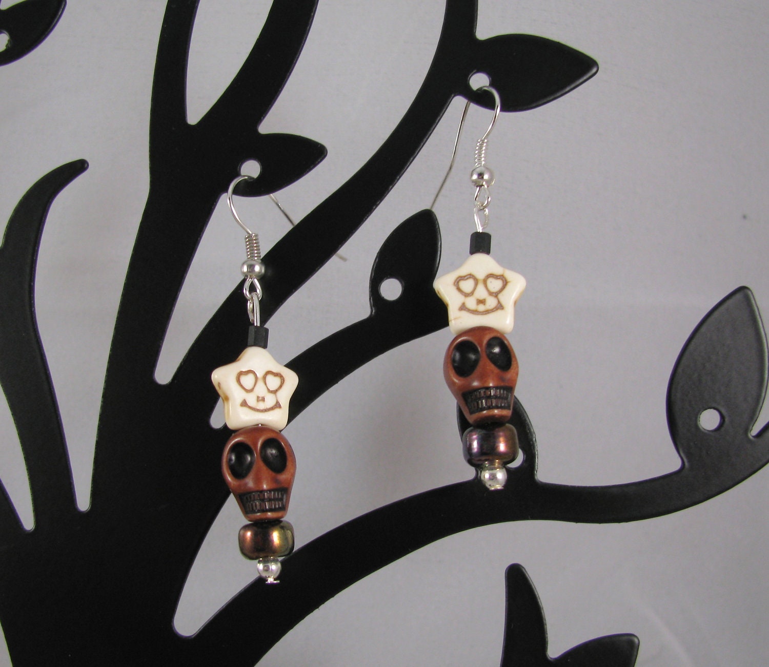 Mahogany resin Skull with creepy smiley stone star sterling dangle earrings