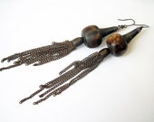 On the Lip of Insanity. Rustic Dark Assemblage Tassel Earrings With African Bone.