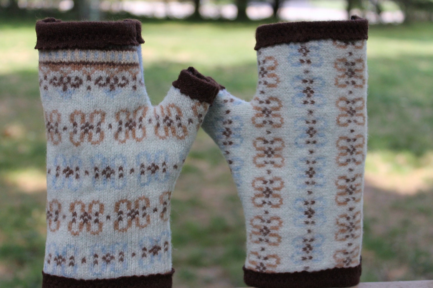 Recycled cashmere and wool fingerless gloves. Robin's egg blue Fair Isle with caramel and chocolate accents.  Brown lining.