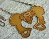 Pelvis Brass Necklace