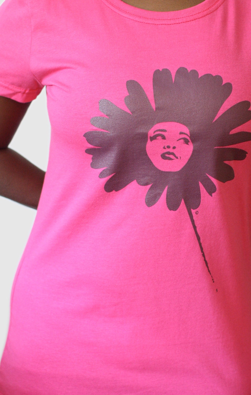 Swarthy Daisy Flower on Pink Tee (Deep Purple Logo)