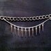 silver spike and multichain bracelet