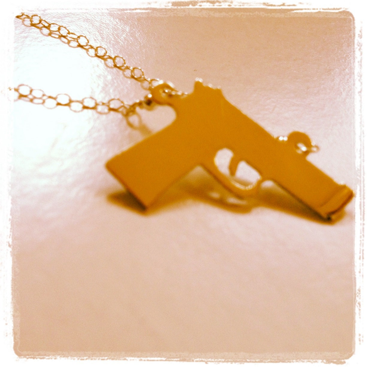 The Gold Gun Necklace