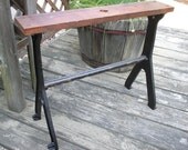 Repurposed and Upcycled cast iron legs with vintage oak wood seat bench