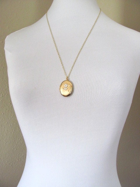Stunning vintage 14k gold oval locket, etched engraved floral design with silver flowers, 1950s or 60s, on long delicate gold chain