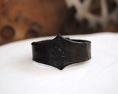 Black leather filigree bracelet