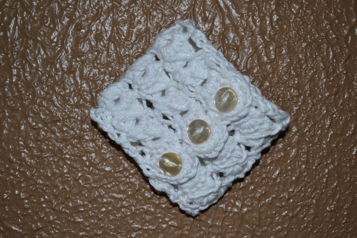 Crocheted white sparkle cuff