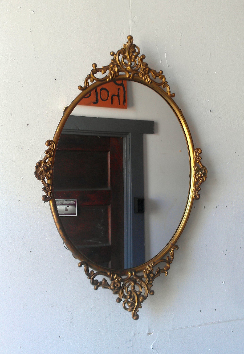 Antique Oval Mirror in Ornate Brass Frame 19 by 12 inches