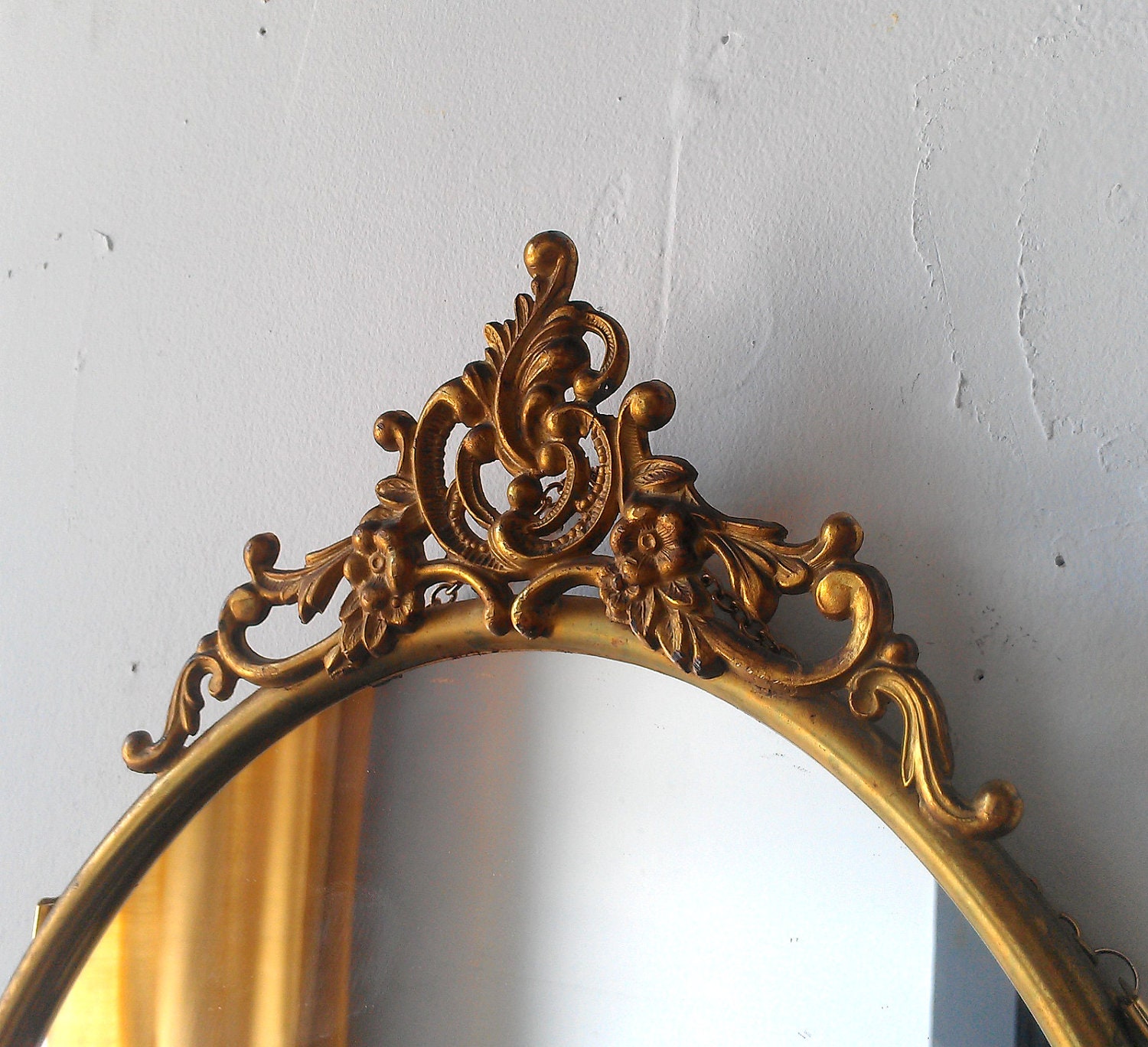 Antique Oval Mirror in Ornate Brass Frame 19 by 12 inches