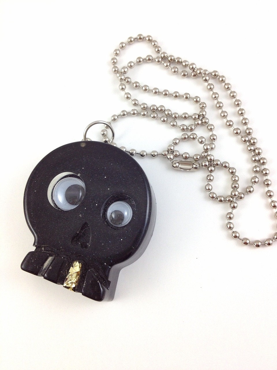 Gold Tooth Googly Eyes Glam Skull Black Glitter Resin Necklace