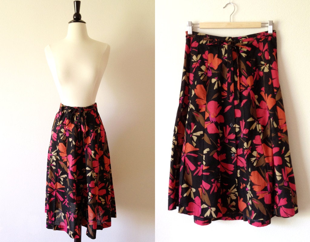 1970s black floral button front knee length midi skirt with tie belt