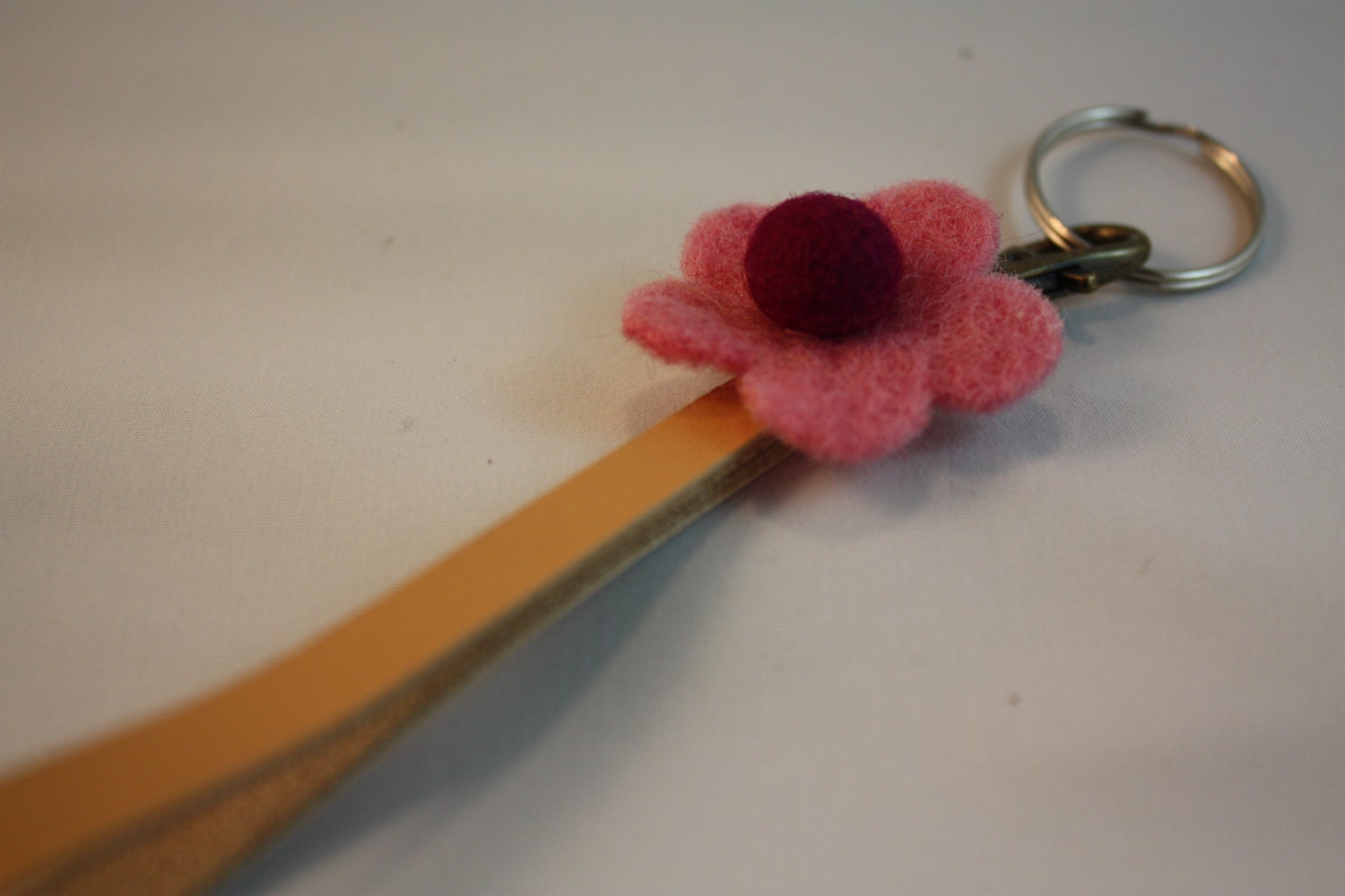 leather key chain with natural wool felt flower