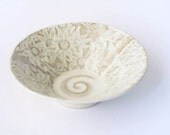 Stoneware bowl in white and bone glaze with Australian Flannel Flower design