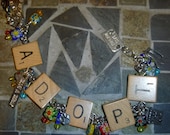ADOPT  charm bracelet recycled scrabble tiles with multicolor millefiori beads