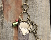Antique gold design with long key and jewels, hand stamped bronze rectangle and brass heart (secret sassy line)