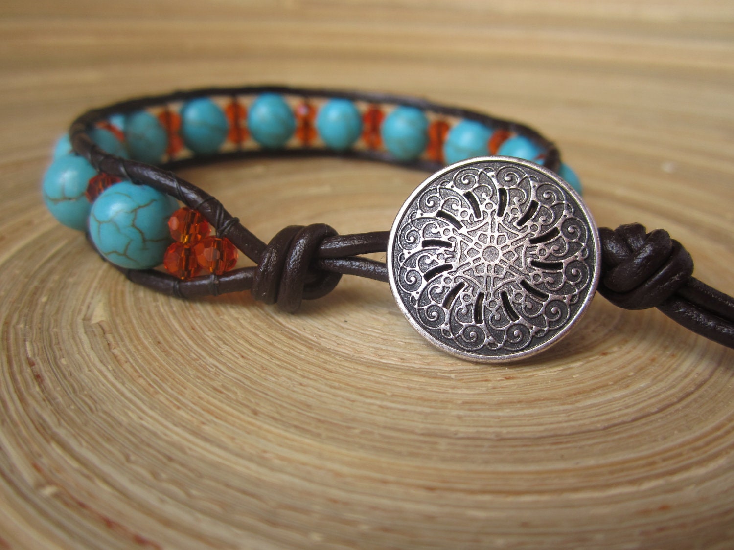 Boho leather wrap bracelet, turquoise and orange beads on brown leather,