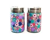 Salt and pepper shakers, glass decorated with Polymer clay flowers