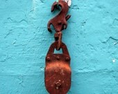 antique locking swivel hook and pulley -- solid cast iron -- industrial americana