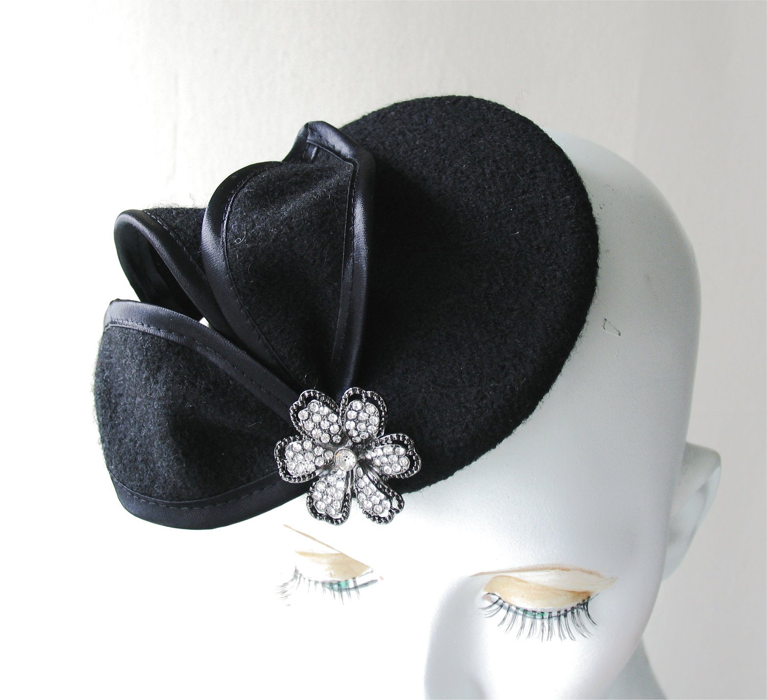 Black cocktail fascinator hat with diamonte flower