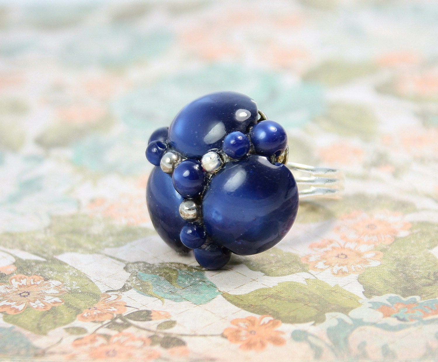 Ring repurposed vintage. Silver tone and adjustable.  Beautiful and one of a kind.