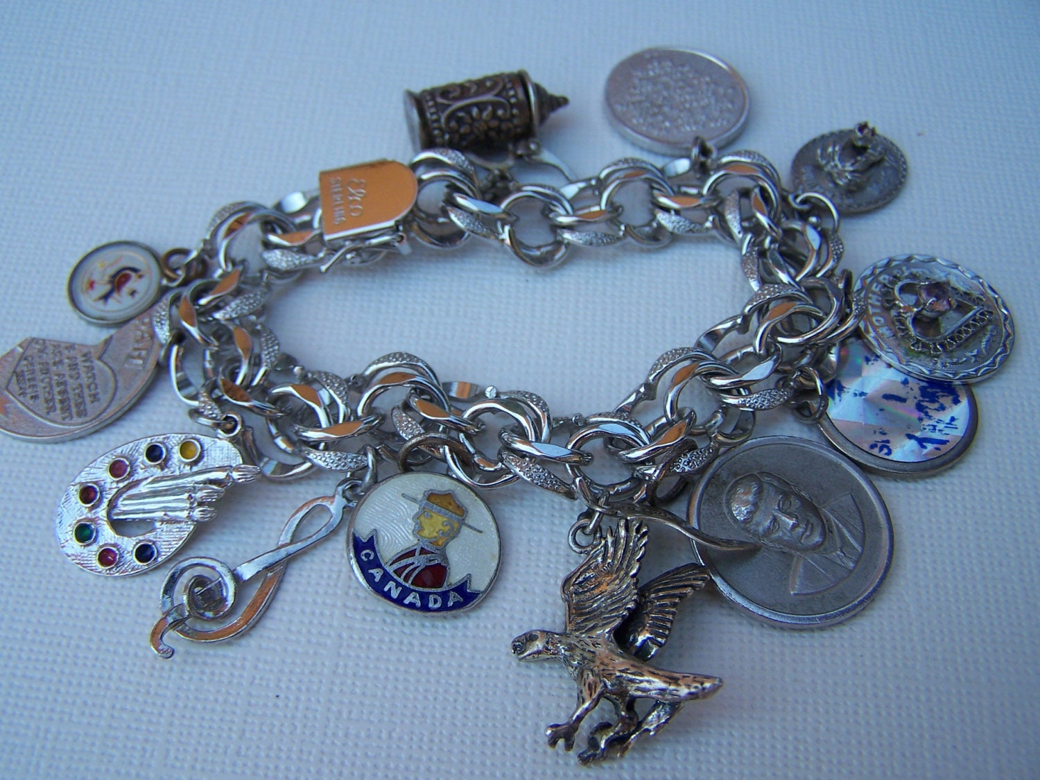 Vintage Elco Sterling Silver Triple Chain Charm Bracelet with Twelve Charms Estate Jewelry 1960s