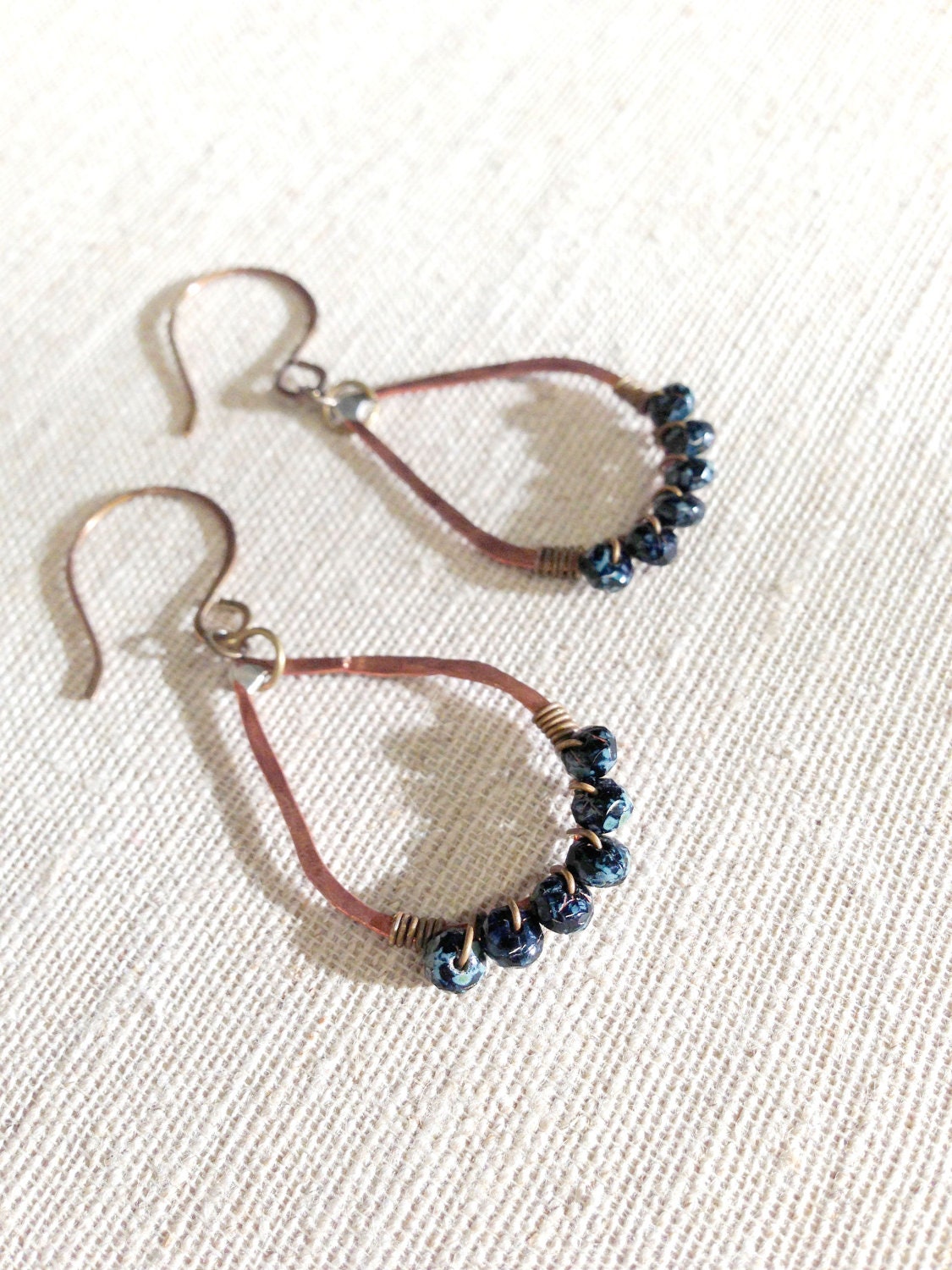 Minaret Earrings in Snowflake Obsidian.  Hammered Copper Teardrop earrings.