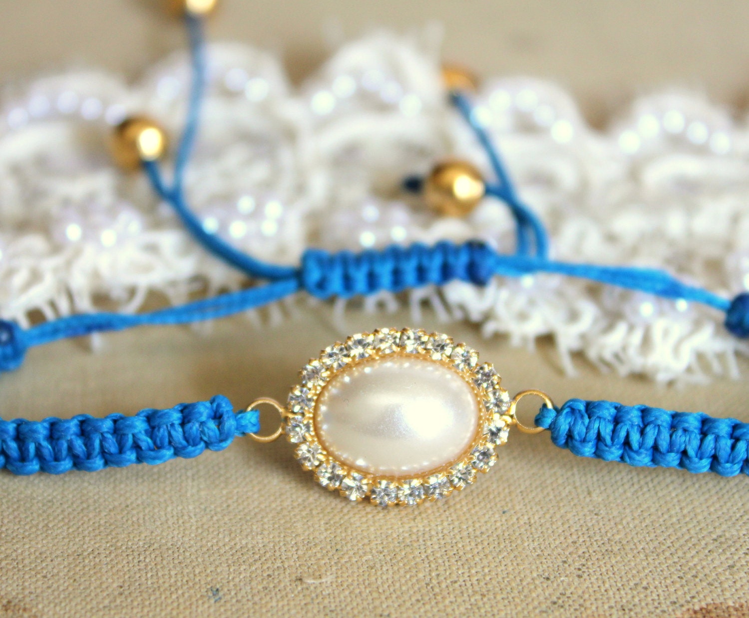 Blue Friendship bracelet braded with pearls and swarovski rhinestones