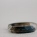 thin multifaceted eco resin ring with blue macaw feathers - size 8