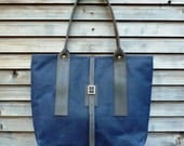 Waxed canvas carry all/ shoulderbag with waxed leather handles and strap COLLECTION UNISEX