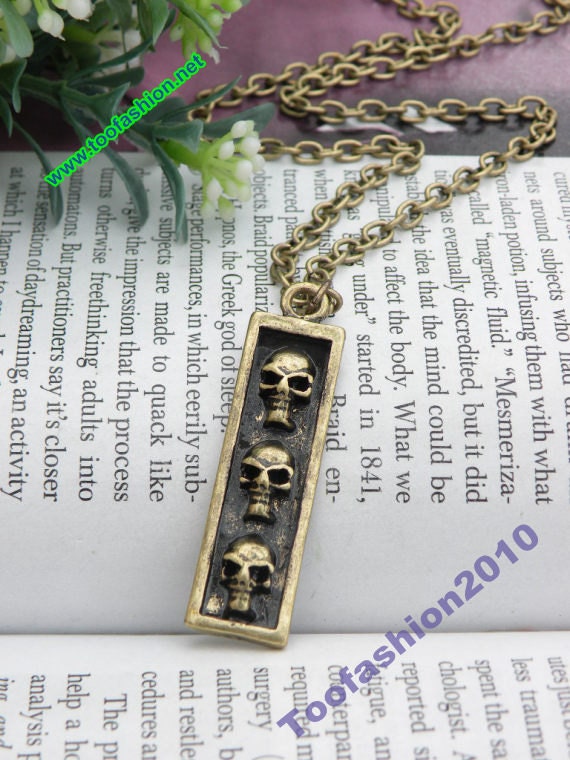 Pretty retro copper rectangle with 3 skull necklace pendant jewelry vintage style