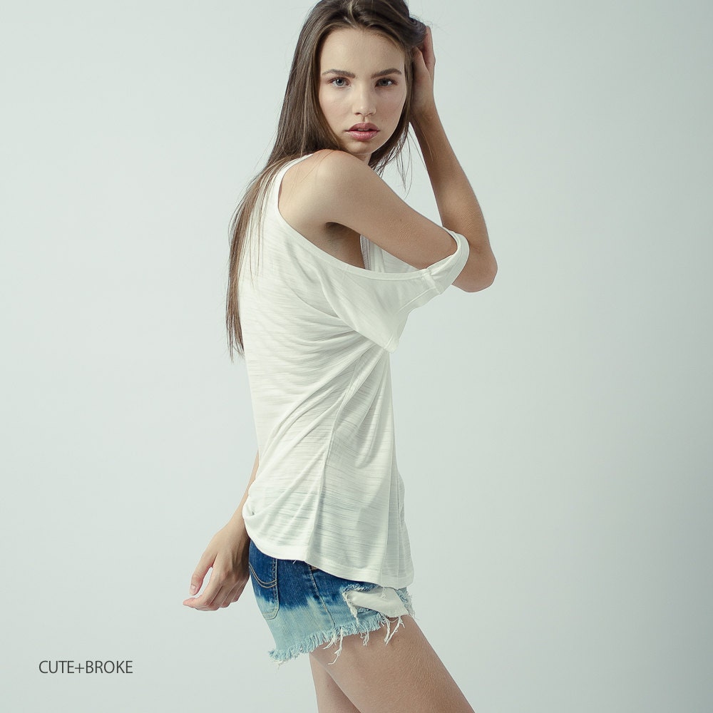 Off shoulder cut out shirt in off white