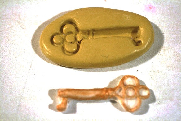Skeleton key Silicone Mold,  2" long. For cake or cupcake decorating, chocolate, hard candy, polymer clay, resin, wax, soap, silicone mould
