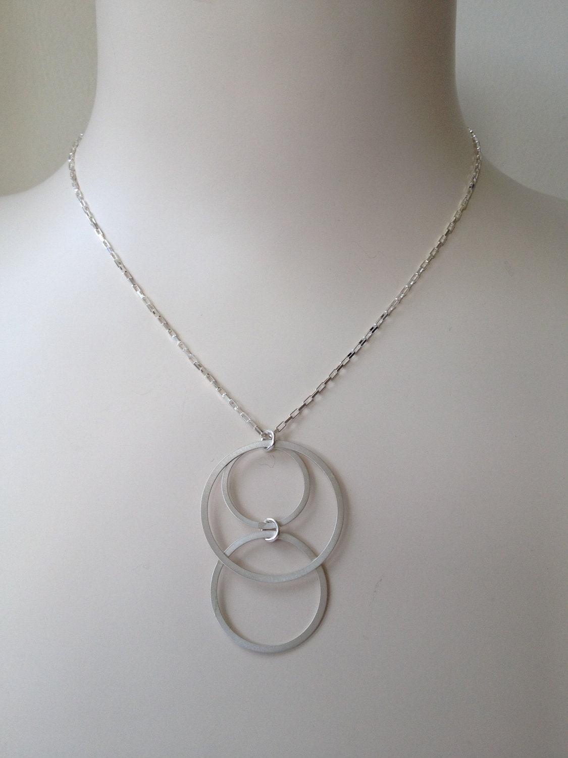 Brushed circles necklace