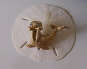 Vintage Gold Walrus Pin Brooch . Koo koo Kachoo . Rhinestone eyes.