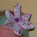 Soft green headband with handmade pink and purple bow- 14 - 16 inches