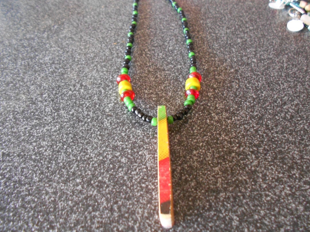 Recycled / upcycled skateboard deck bracelet one of a kind rasta red yellow green black