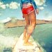 Surfer girl riding wave Maui Hawaii orange shorts turquoise water canvas