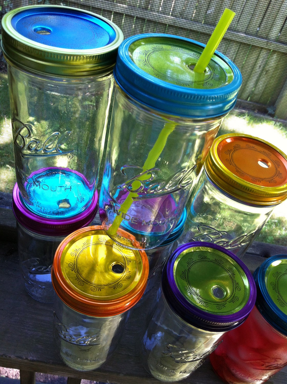 A Pair of New Mason Jar Tumbler Glasses With Lids