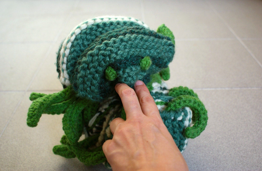 Knitted caterpillar toy