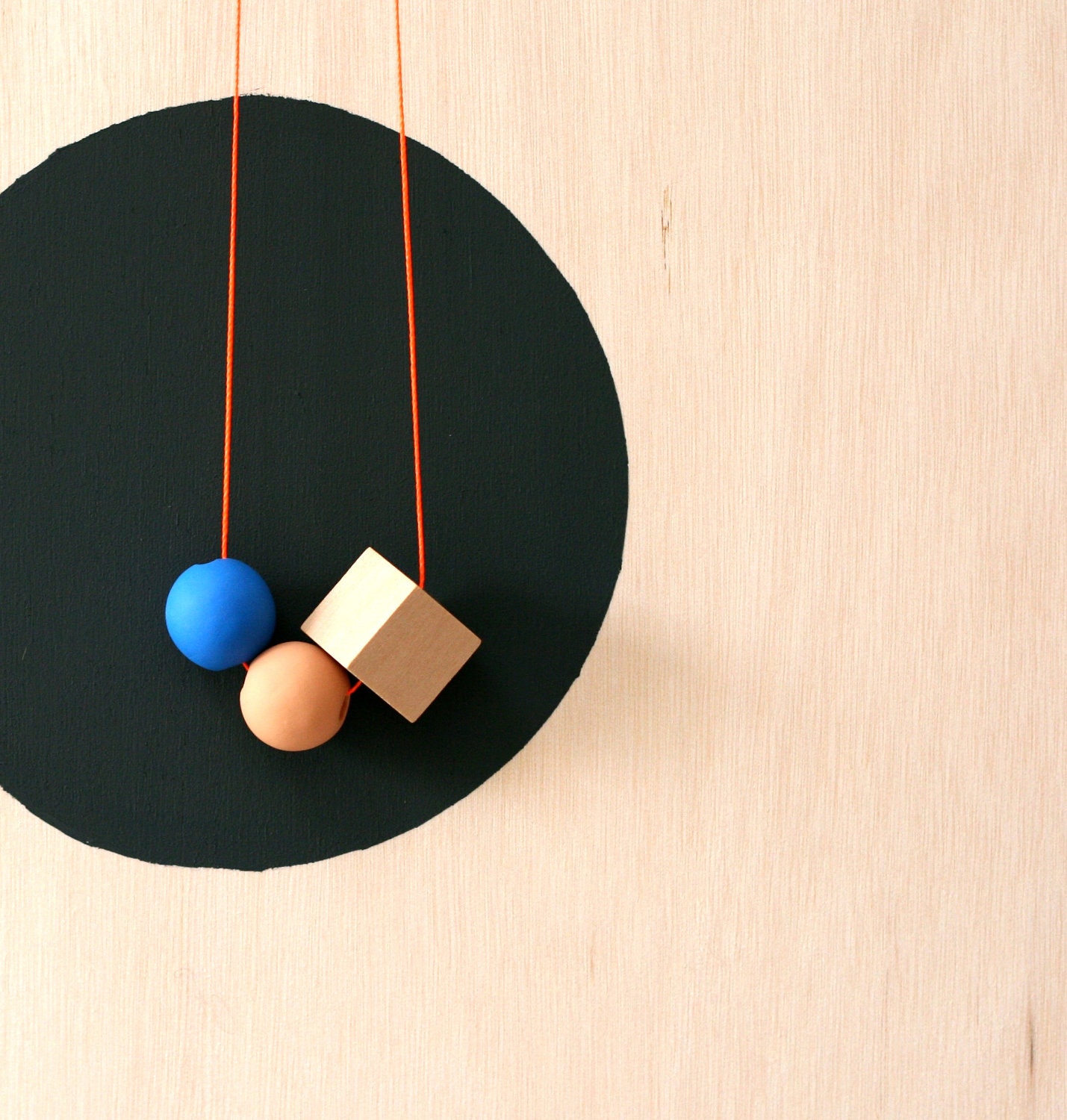 and a cube makes a necklace