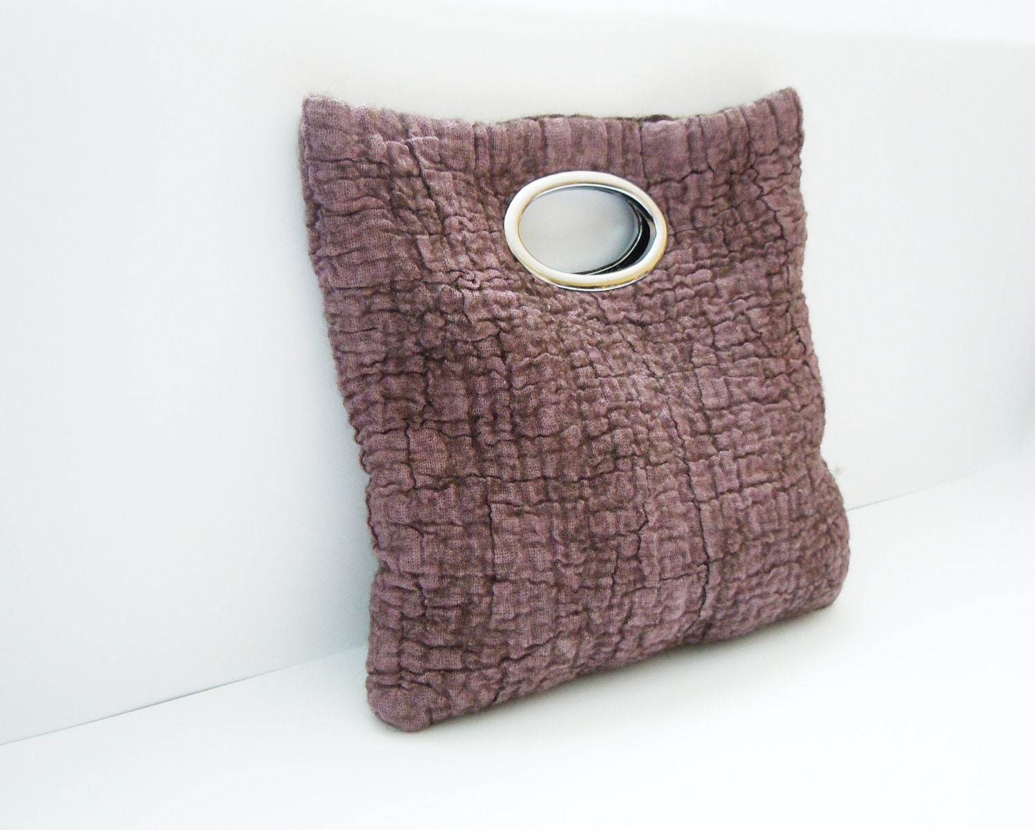 Felted rosy brown colour handbag.
